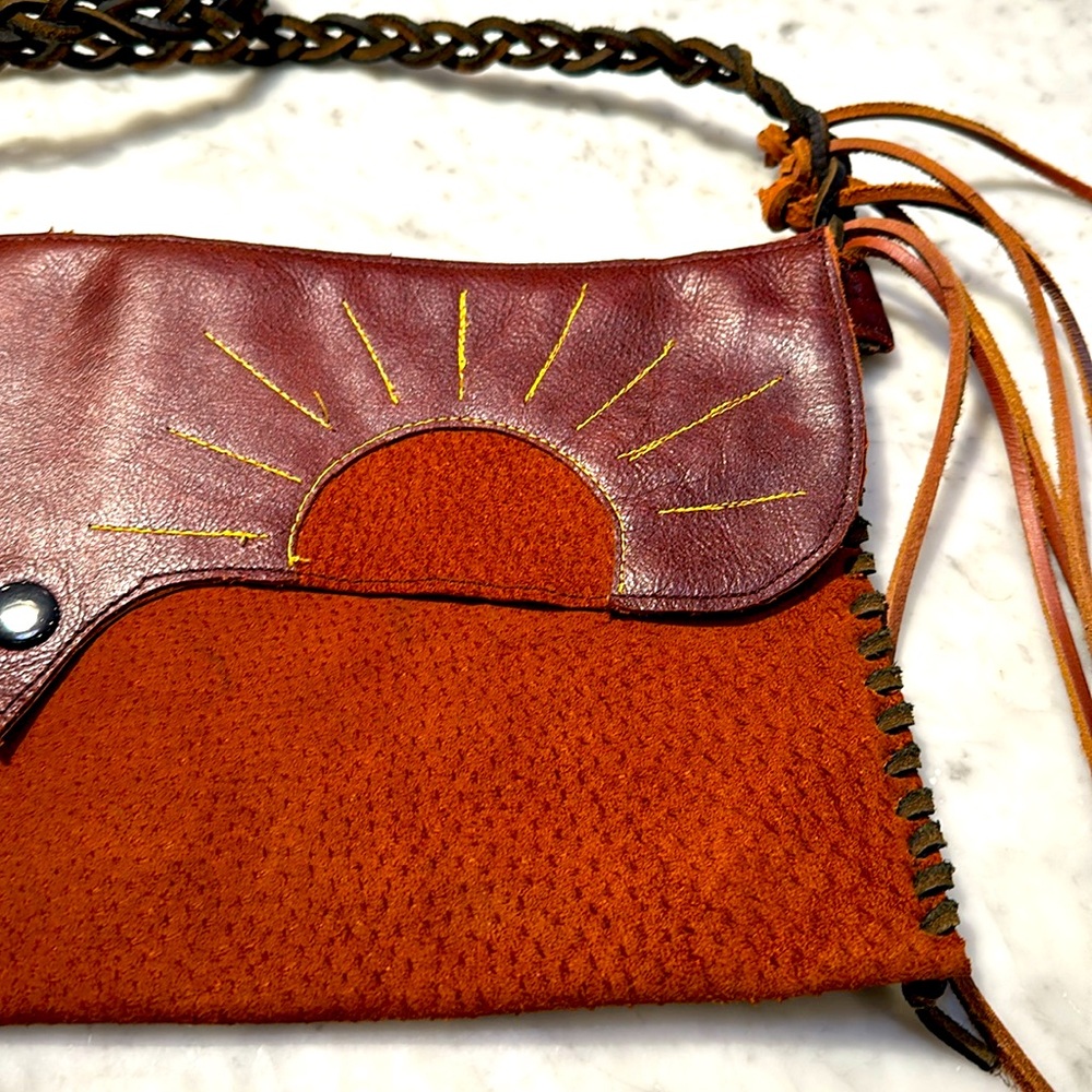 Vintage handhold leather purse/ satchel. Bohemian tassels